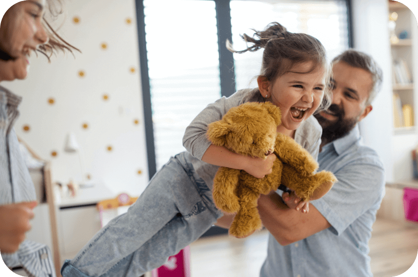 Family Smiling and Playing